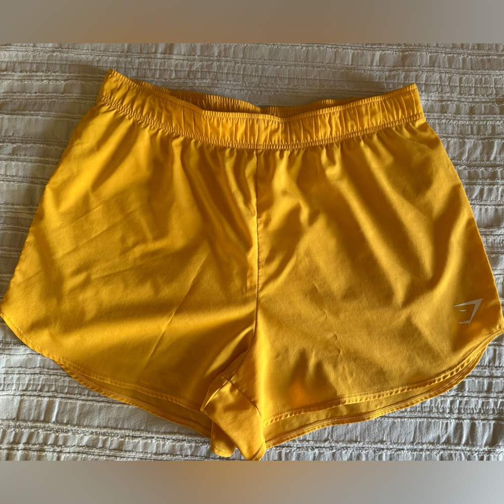 Used Gymshark women’s running/lounging shorts in yellow, size Large.